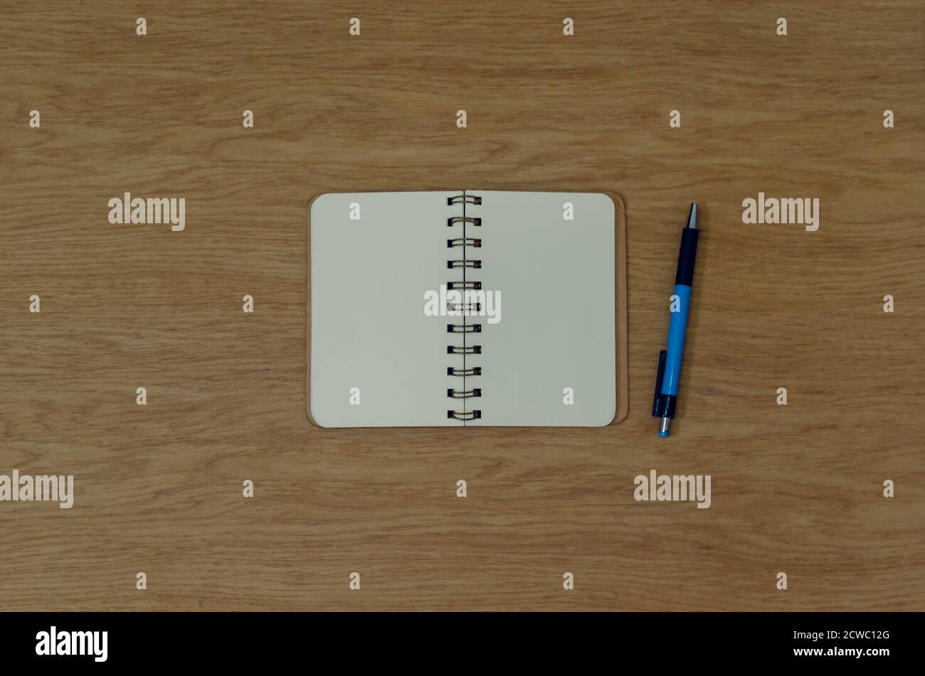 Top view notepad and pen on wood background Stock Photo