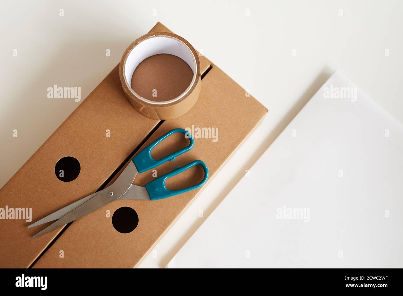 Grif-wrapping paper, scissors, sticky tape and decorations Stock Photo -  Alamy