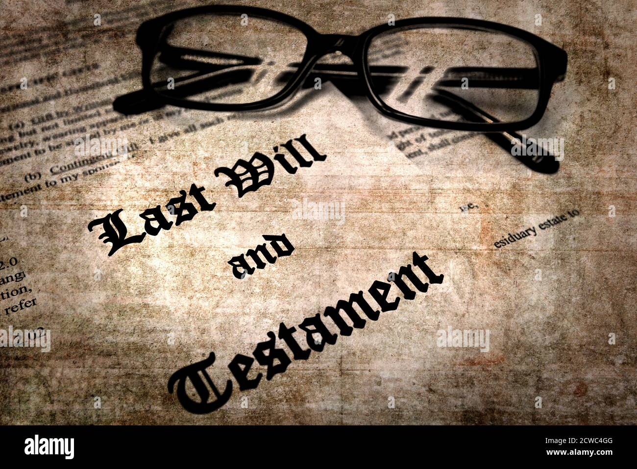 Envelope with Last Will and Testament and Reading Glasses Stock Photo