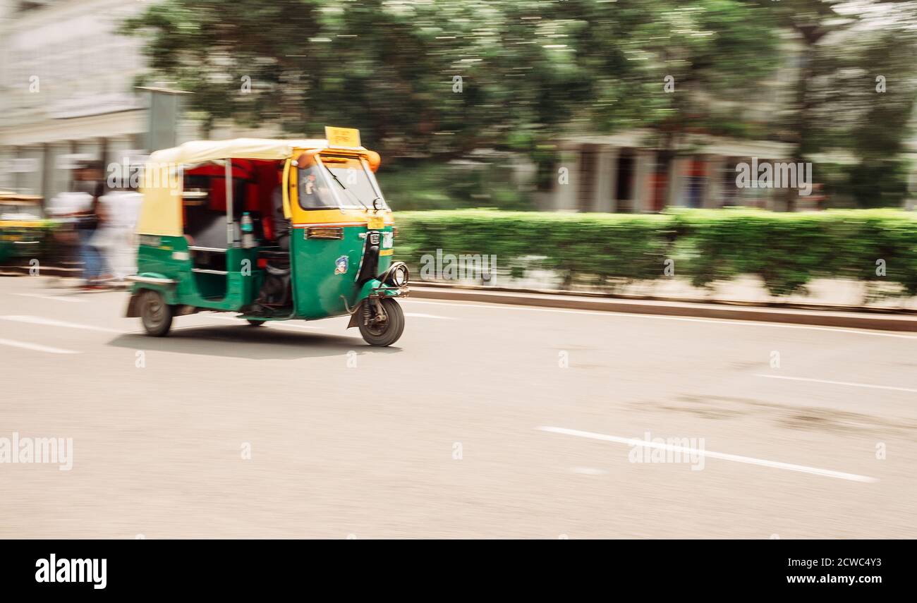 Moto Rickshaw in motion, New Delhi, India. Stock Photo