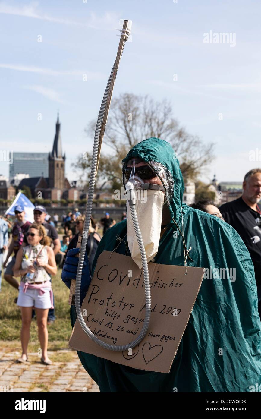 German Corona rebels protest against coronavirus restrictions such as the wearing of masks and assembly orders imposed by the German government, Düsseldorf, Germany. Stock Photo