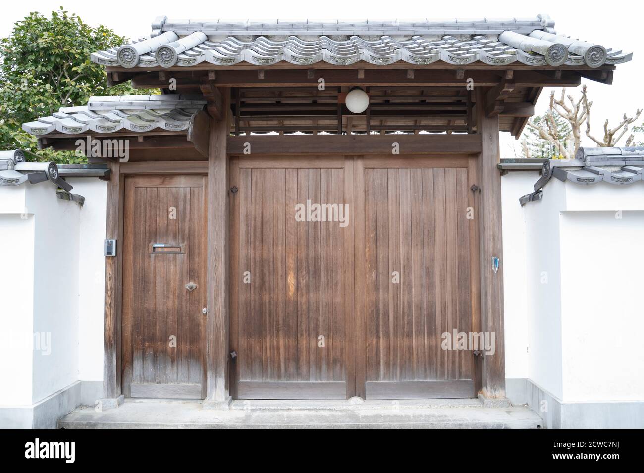 Old wood door house in japan Stock Photo - Alamy