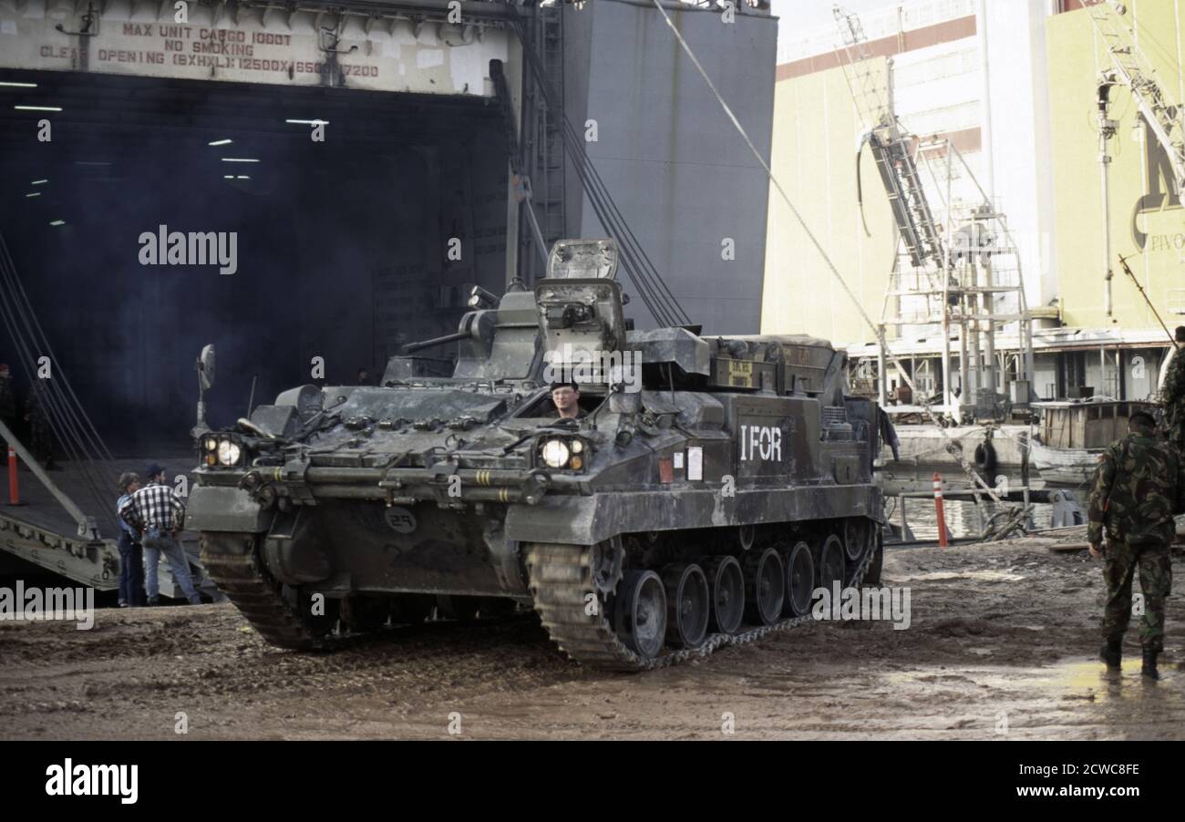 13th January 1996 During the war in Bosnia: British Army armour, part of the IFOR contingent, unloading from the United States Navy transport ship, MV Cape Race, in the port of Split, Croatia. Stock Photo