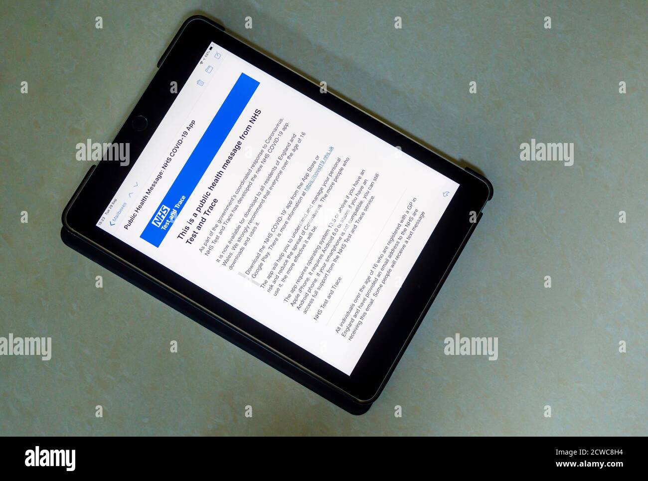 Email public health message on the screen of an IPad with details of