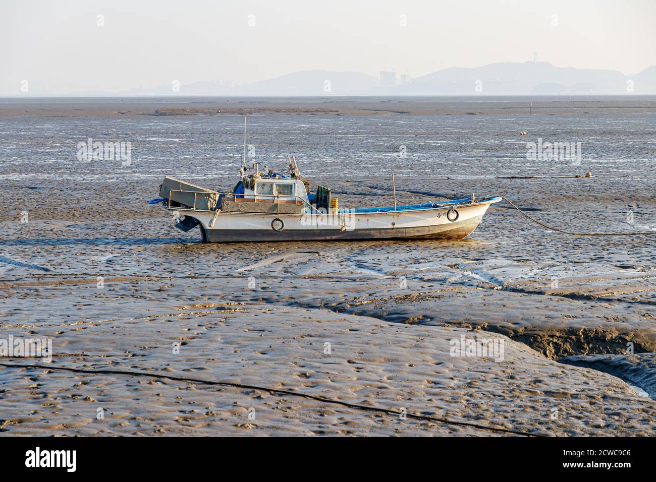 Incheon, Korea  January 3 , 2020 - Anchored sea fishing boat. Fishing boat landscape .Ganghwado tidal fishing boat landscape. Korean sea landscape. Stock Photo