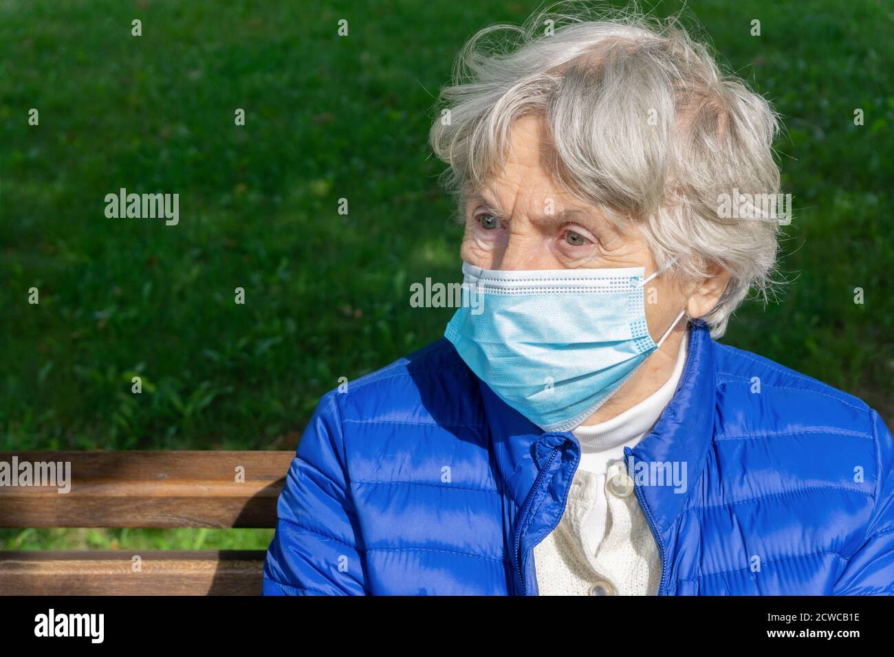Old lady in protective mask hi-res stock photography and images - Alamy