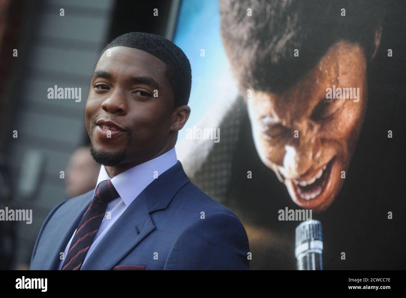 NEW YORK, NY - JULY 21: Chadwick Boseman attends the 'Get On Up' premiere at The Apollo Theater on July 21, 2014 in New York City  People:  Chadwick Boseman Stock Photo
