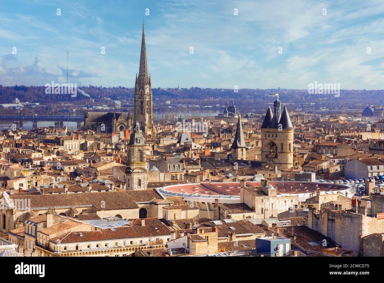 Bordeaux, Gironde Department, Aquitaine, France.   High view over rooftops to Porte de la Grosse Cloche and to its left the spire of St Eloi church. T Stock Photo