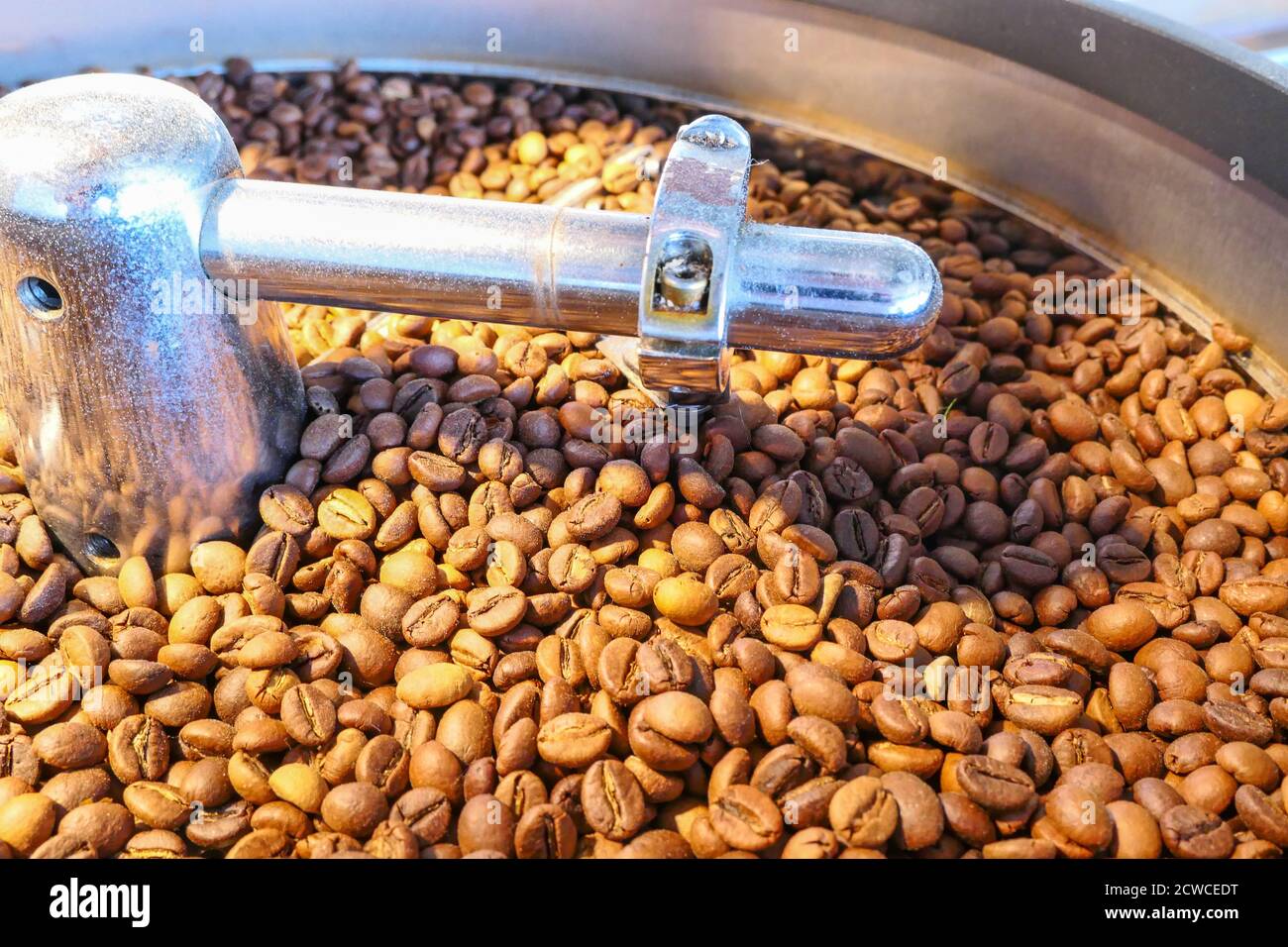 roasting coffee bean on the machine Stock Photo Alamy