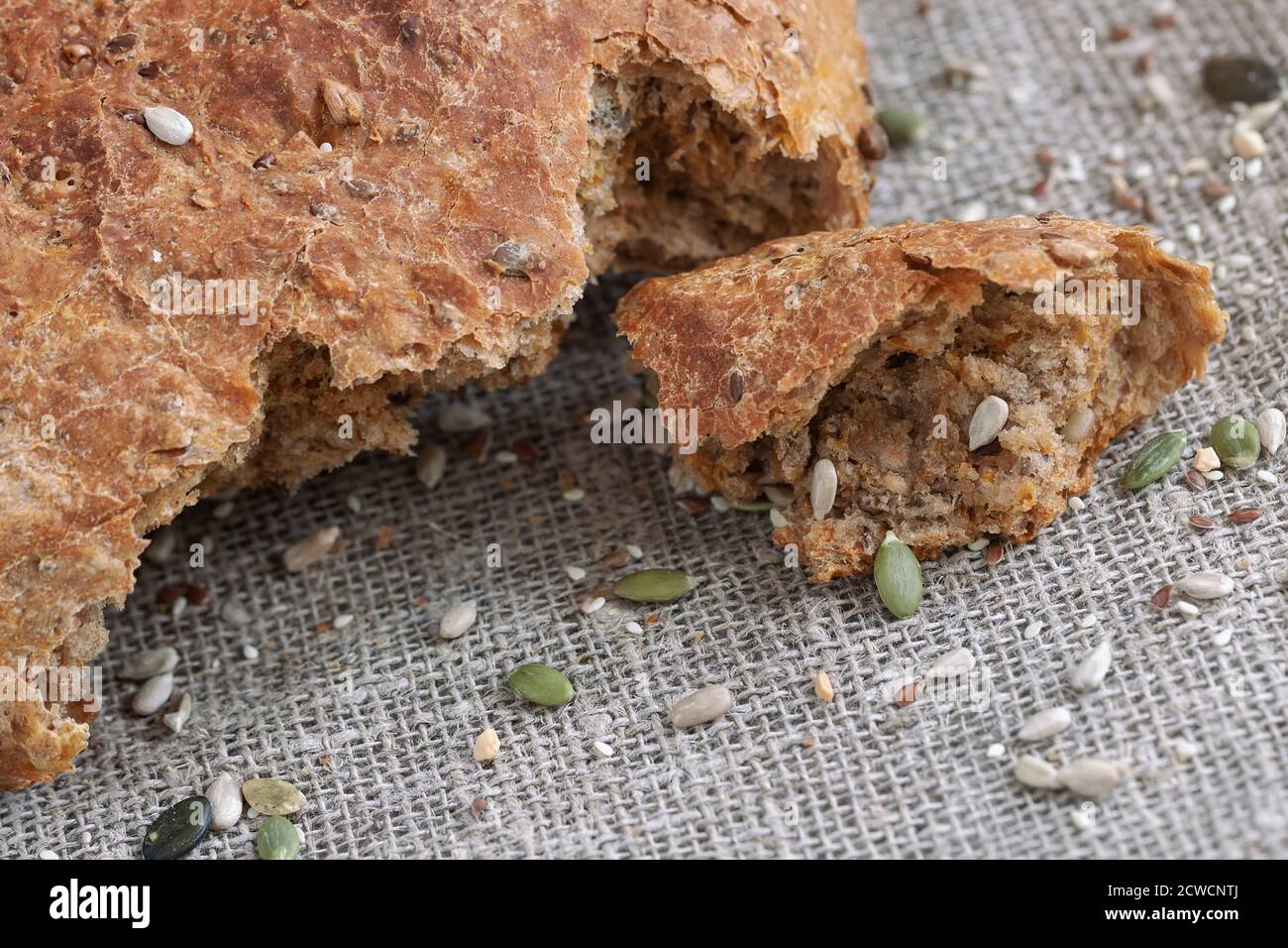 Homemade bread and slice, whole seed, sunflower and flax seeds Stock Photo