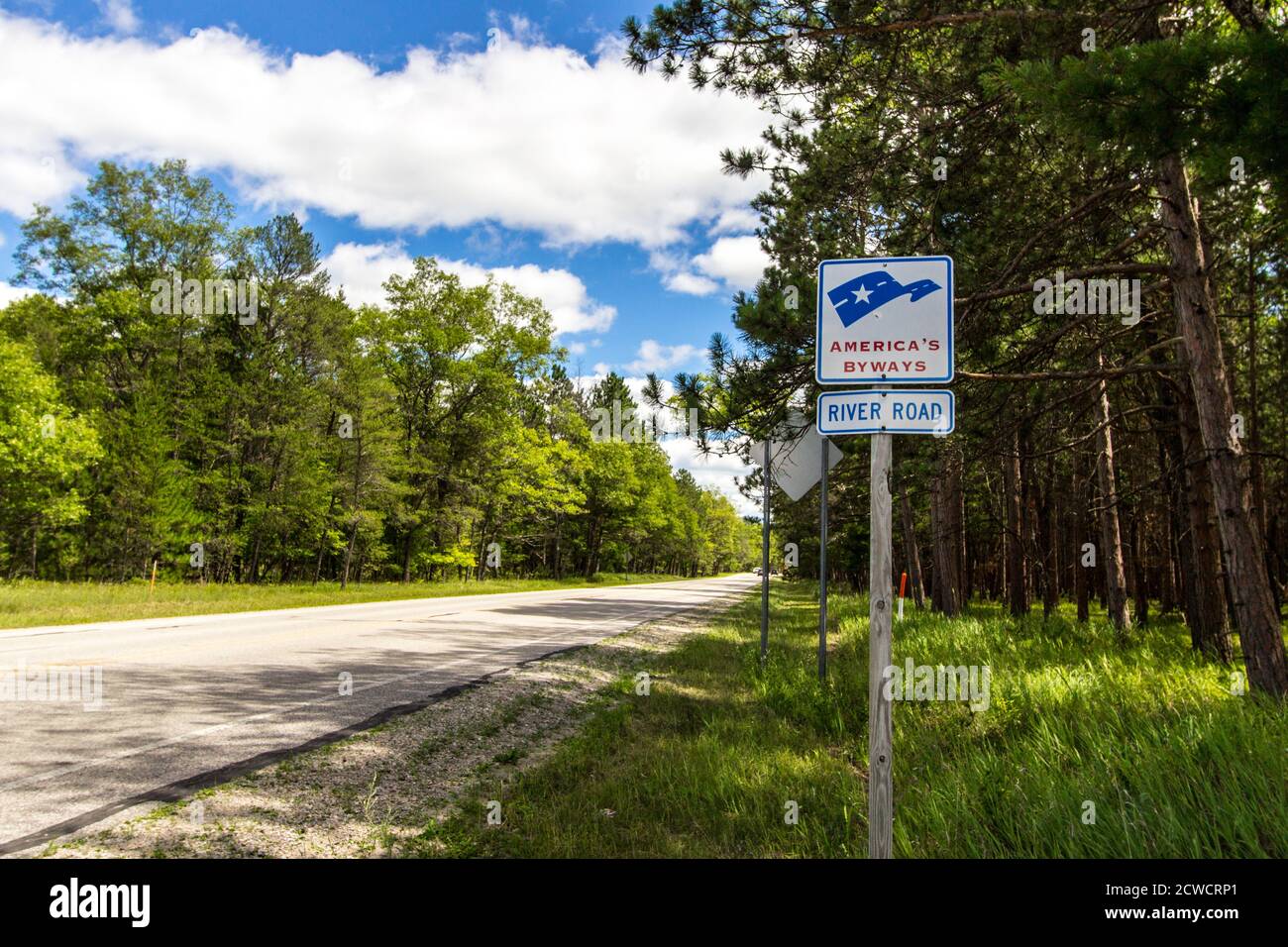 Sign for the River Road Scenic Byway in the Huron Manistee National Forest. The scenic road winds through the forest of northern Michigan. Stock Photo