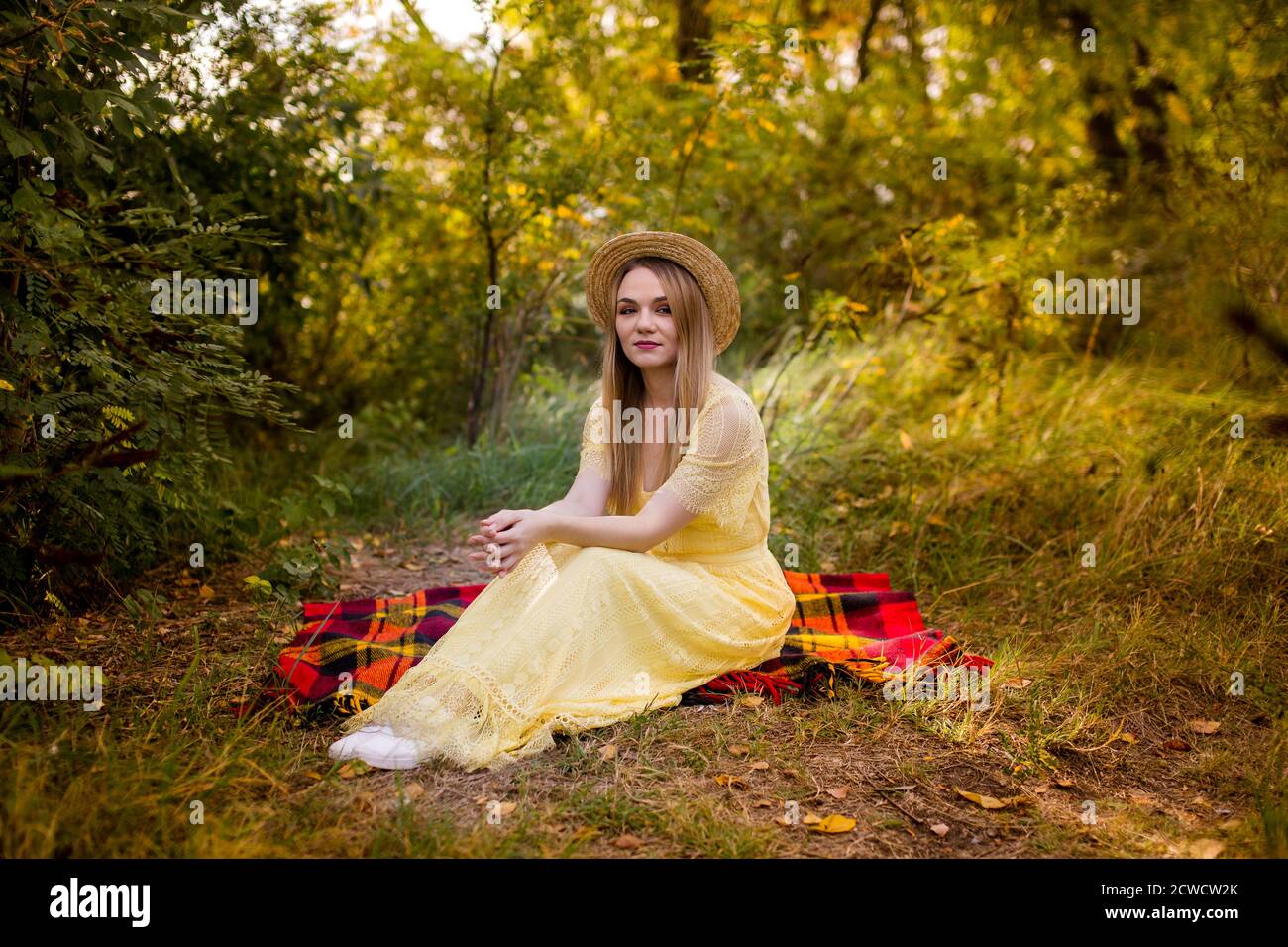 image of a beautiful girl in a straw hat in autumn Stock Photo - Alamy