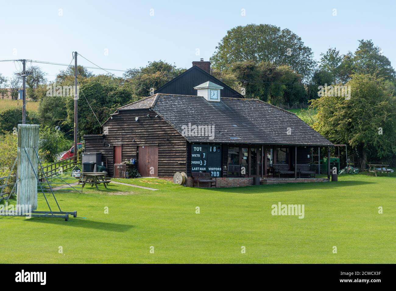 Cricket pavilion and pitch in the village of West Ilsley, Berkshire, UK Stock Photo