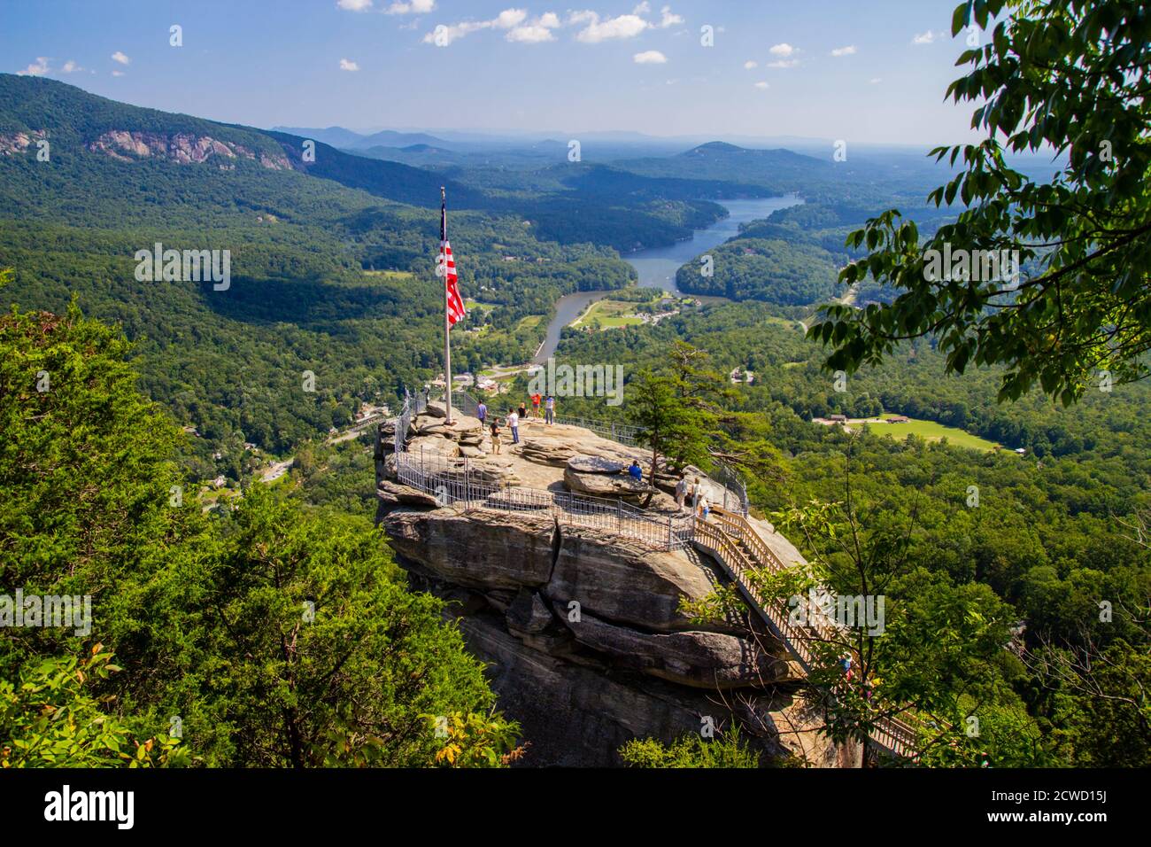Lake Lure, North Carolina, USA - September 21, 2014: The peak of Chimney Rock overlooking Lake Lure and the surrounding Appalachian Mountains. Stock Photo