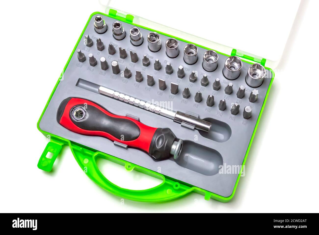 Budget hand tool.Mechanical handle and attachments in the form of heads and screwdrivers.In the package. Stock Photo