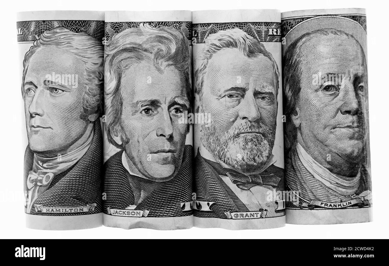 Three Presidents and Ben Franklin on US Banknotes Paper Money, side by side, federal reserve notes, rolled to show only portraits, Hamilton, Jackson, Stock Photo