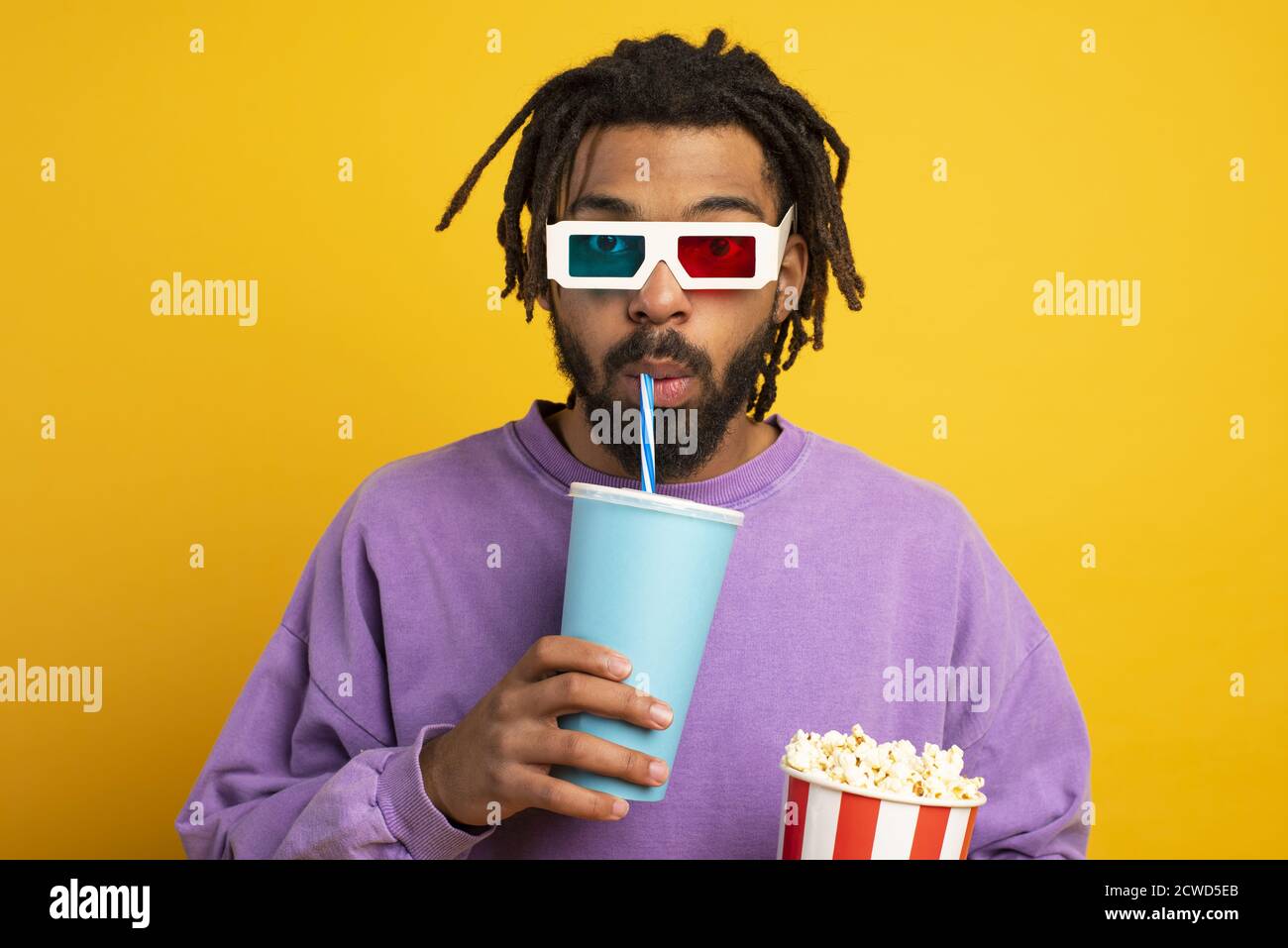 Boy has fun watching a film. concept of entertainment and streaming tv Stock Photo