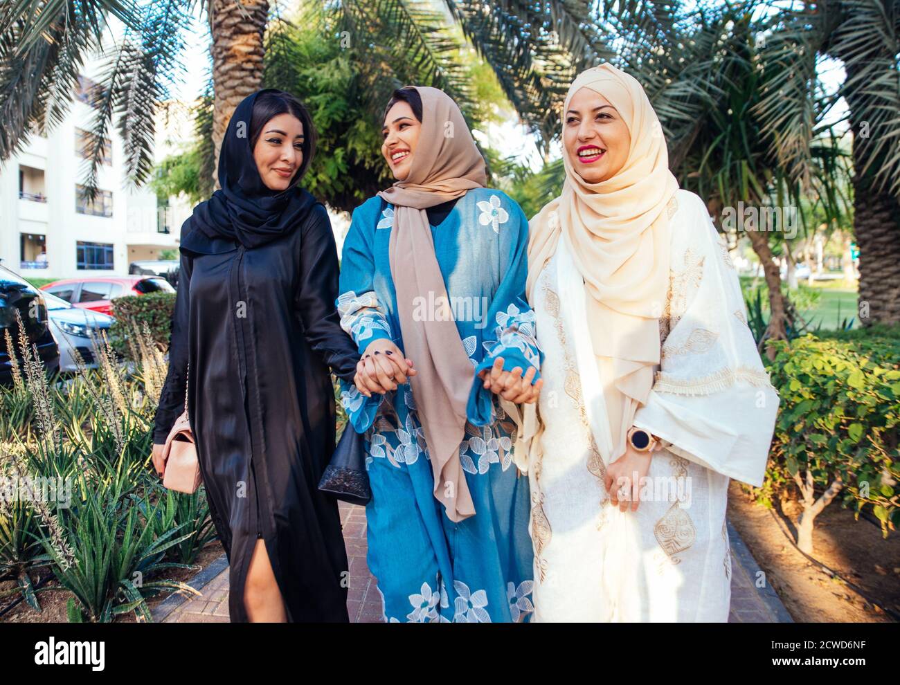 Three Women Friends Going Out In Dubai Girls Wearing The United Arab