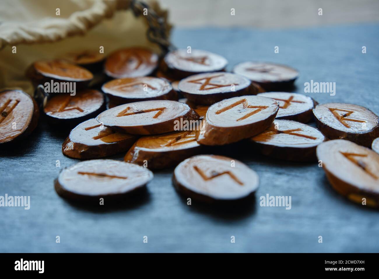 wooden runes in a canvas bag Stock Photo