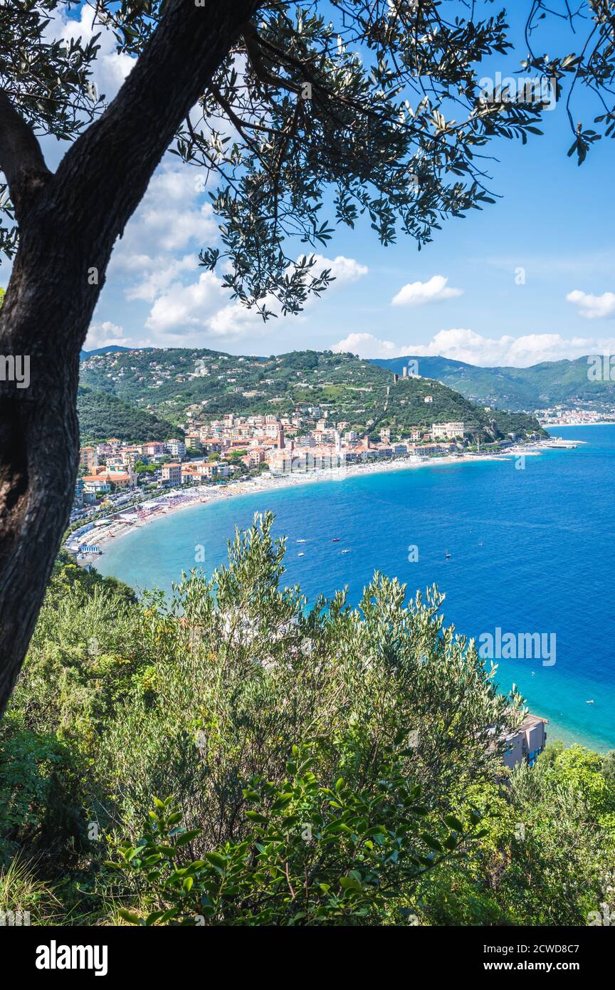 Noli, in a very sunny day, its towers and a very blue sea, Ligury, Italy Stock Photo