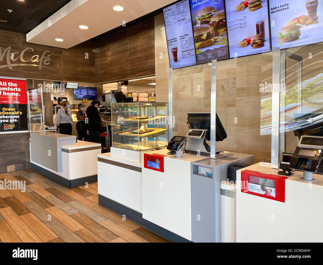 Orlando, FL/USA-9/1/20: The order and payment counter with plexiglass shields for the the coronavirus pandemic at a McDonalds in Orlando, Florida. Stock Photo