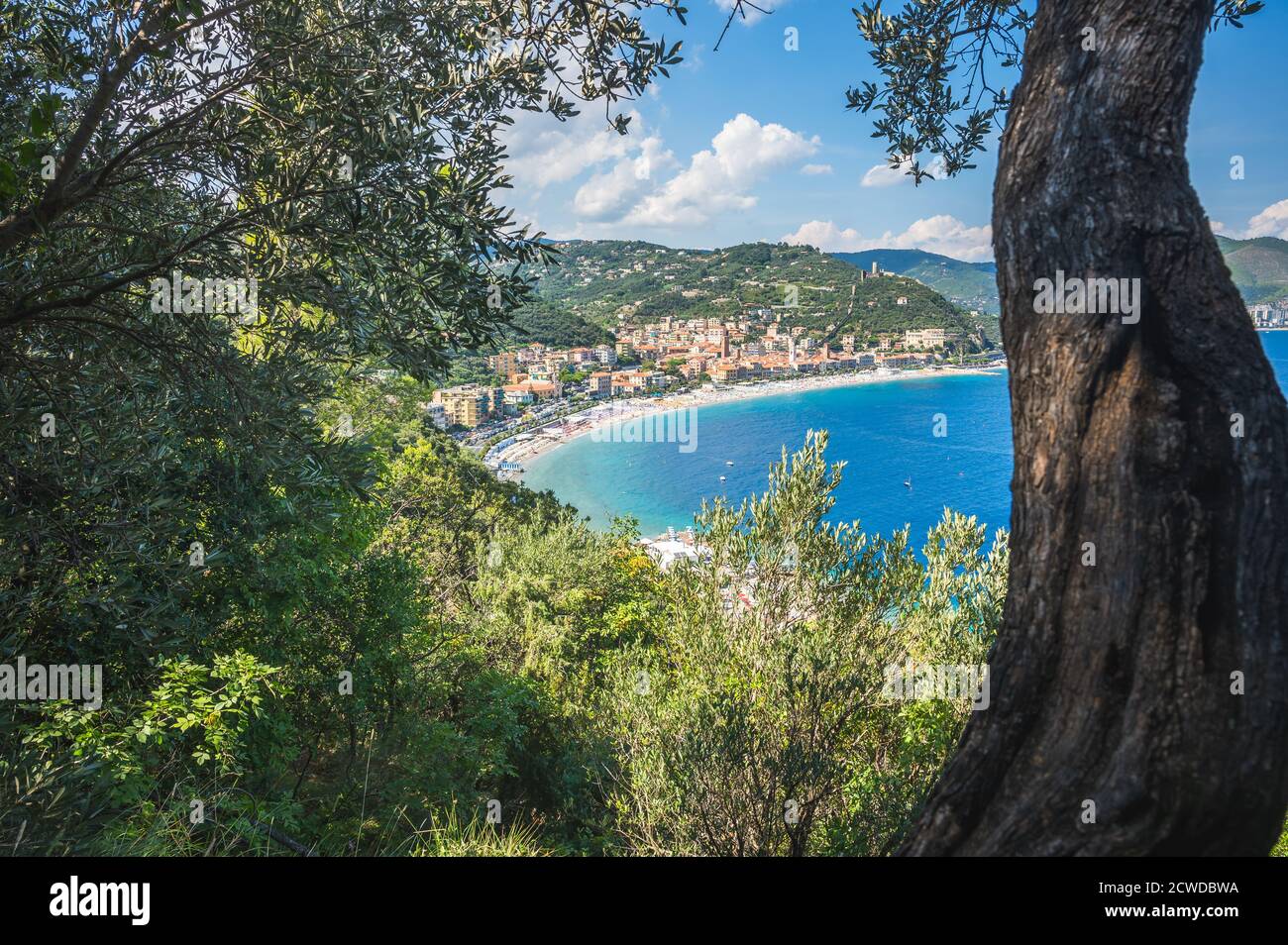Noli, in a very sunny day, its towers and a very blue sea, Ligury, Italy Stock Photo