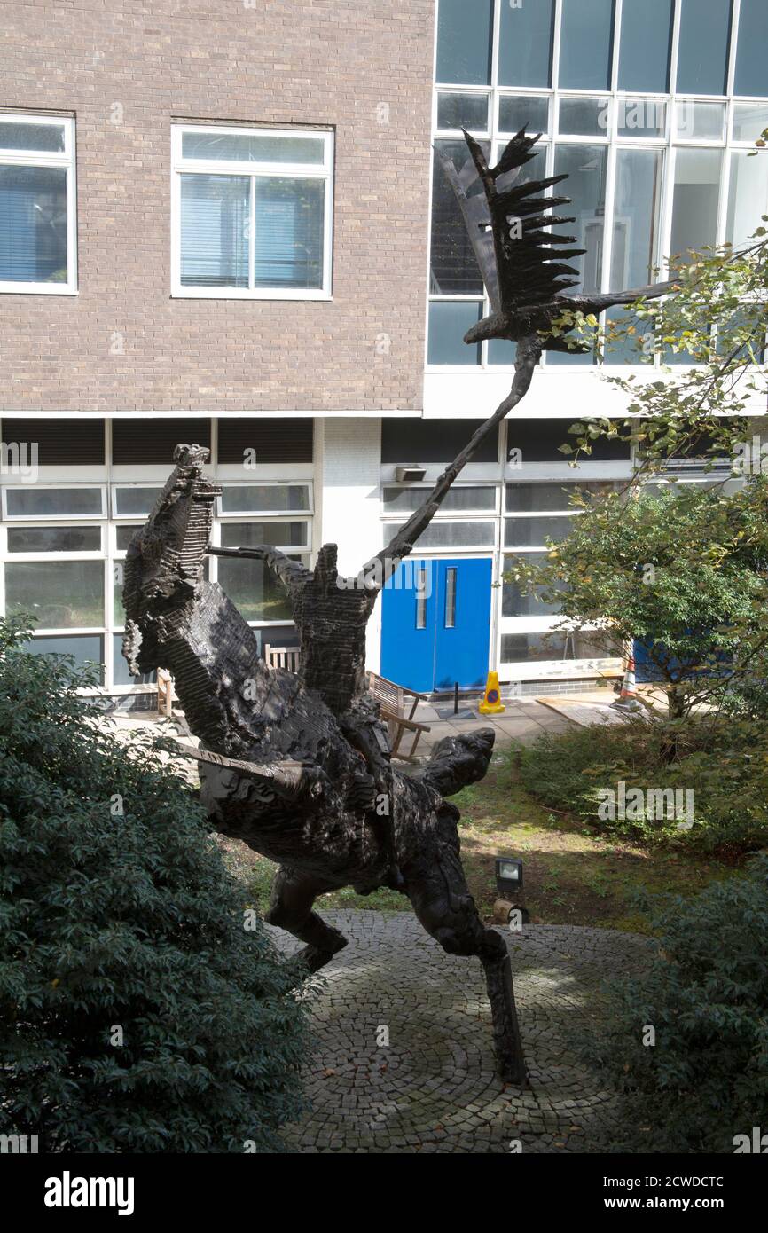 The sculpture, Horse and Rider by Robert Clatworthy in the grounds of Charing Cross Hospital, Hammersmith, London W6, UK Stock Photo