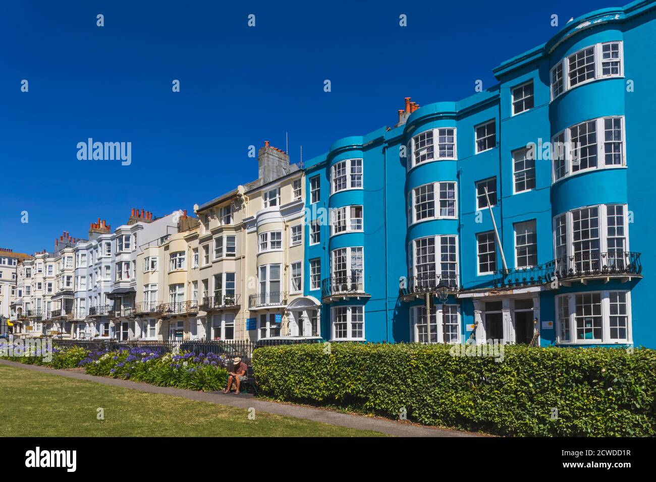 England, East Sussex, Brighton, Kemptown, The New Steine Gardens and Colourful Hotels and Residential Buildings Stock Photo