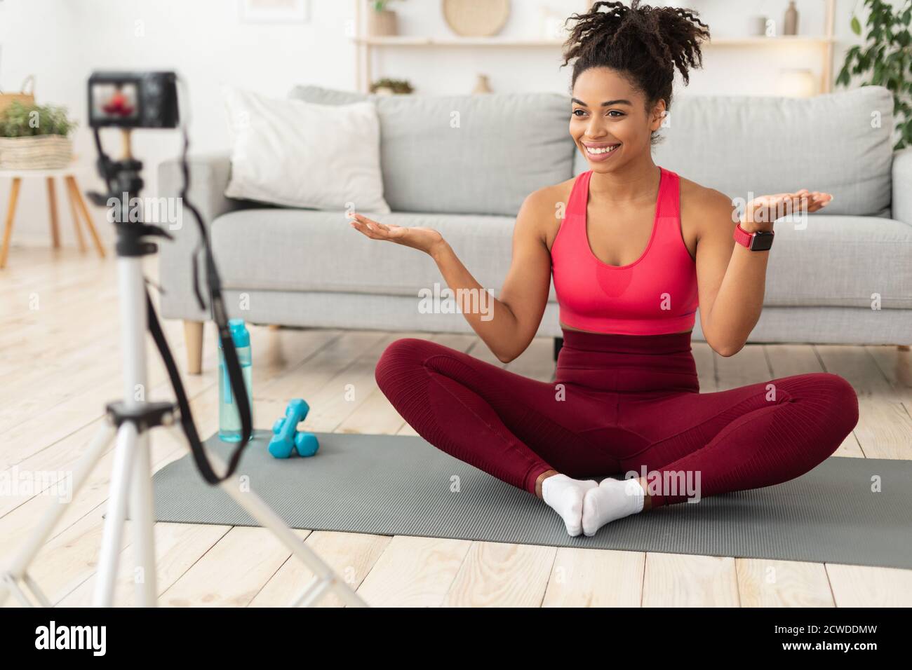 African American Female Fitness Blogger Exercising Making Workout Video Indoor Stock Photo Alamy