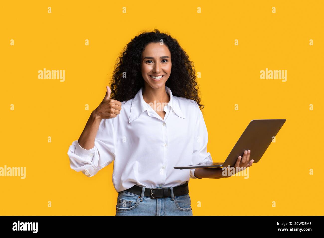 Business woman happy showing thumb hi-res stock photography and images ...