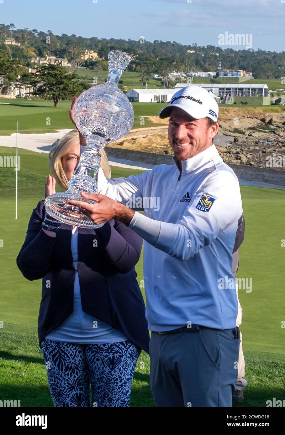 Pebble Beach, Carmel, California, USA. 9th Feb, 2020. Nick Taylor holds up the trophy for the win of the championship round of the AT&T Pro-Am on Sunday Credit: Action Plus Sports/Alamy Live News Stock Photo