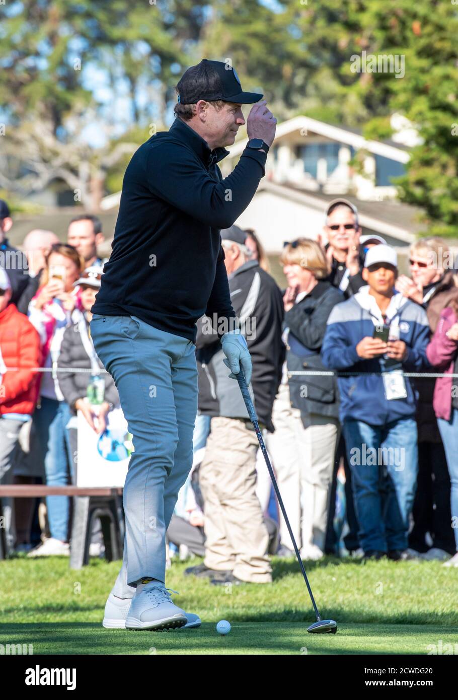 Pebble Beach, Carmel, California, USA. 9th Feb, 2020. Steve Young tips his hat to the gallery before teeing off in the championship round of the AT&T Pro-Am on Sunday Credit: Action Plus Sports/Alamy Live News Stock Photo