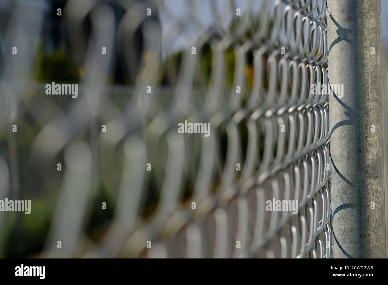 Close up of a chain link fence and fence post recently erected next to the  bike path on my way to work. Ottawa, Ontario, Canada Stock Photo - Alamy