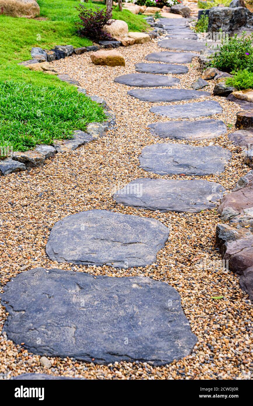 Stone stepping pathway in a Japanese style garden Stock Photo - Alamy