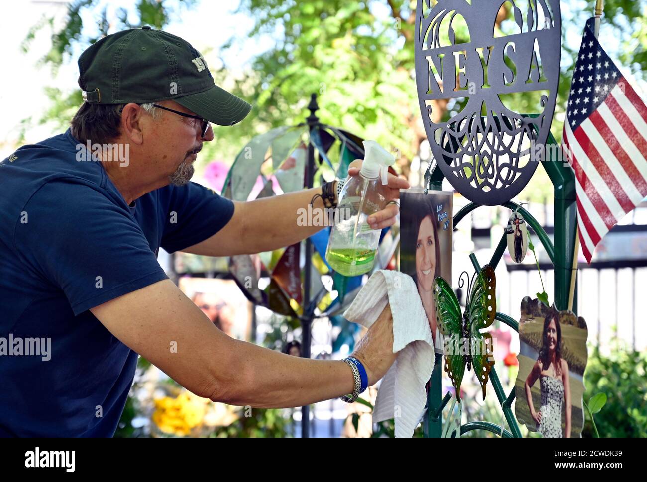 Las Vegas, Nevada, USA. 29th Sep, 2020. Chris Davis cleans a photograph
