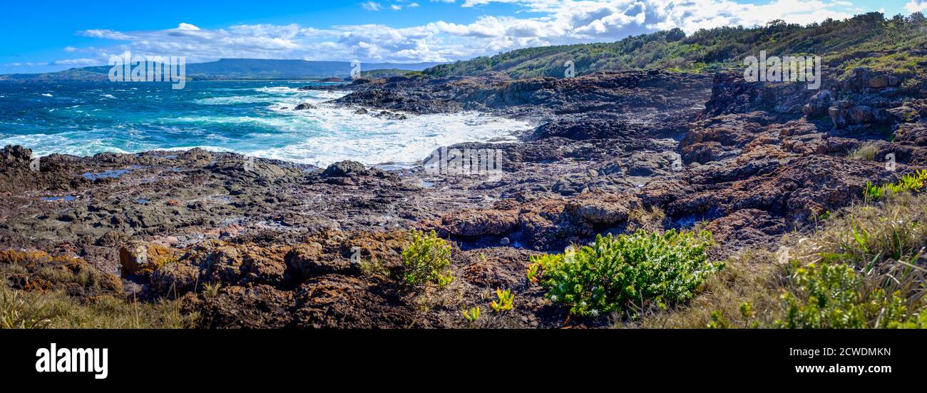 Panorama Bass Point Reserve across Pacific Ocean to Mystics Beach Minnamurra with Saddleback Mountain in distance, Shellharbour nsw Australia Stock Photo