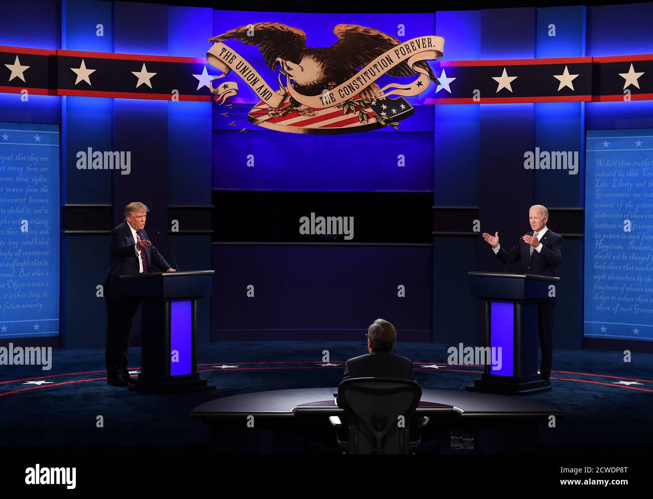 Cleveland, United States. 29th Sep, 2020. President Donald Trump (L) and Democratic presidential nominee Joe Biden (R), with Chris Wallace moderating, face off in the first of three scheduled 90 minute presidential debates, in Cleveland, Ohio, on Tuesday, September 29, 2020. Photo by Kevin Dietsch/UPI Credit: UPI/Alamy Live News Stock Photo