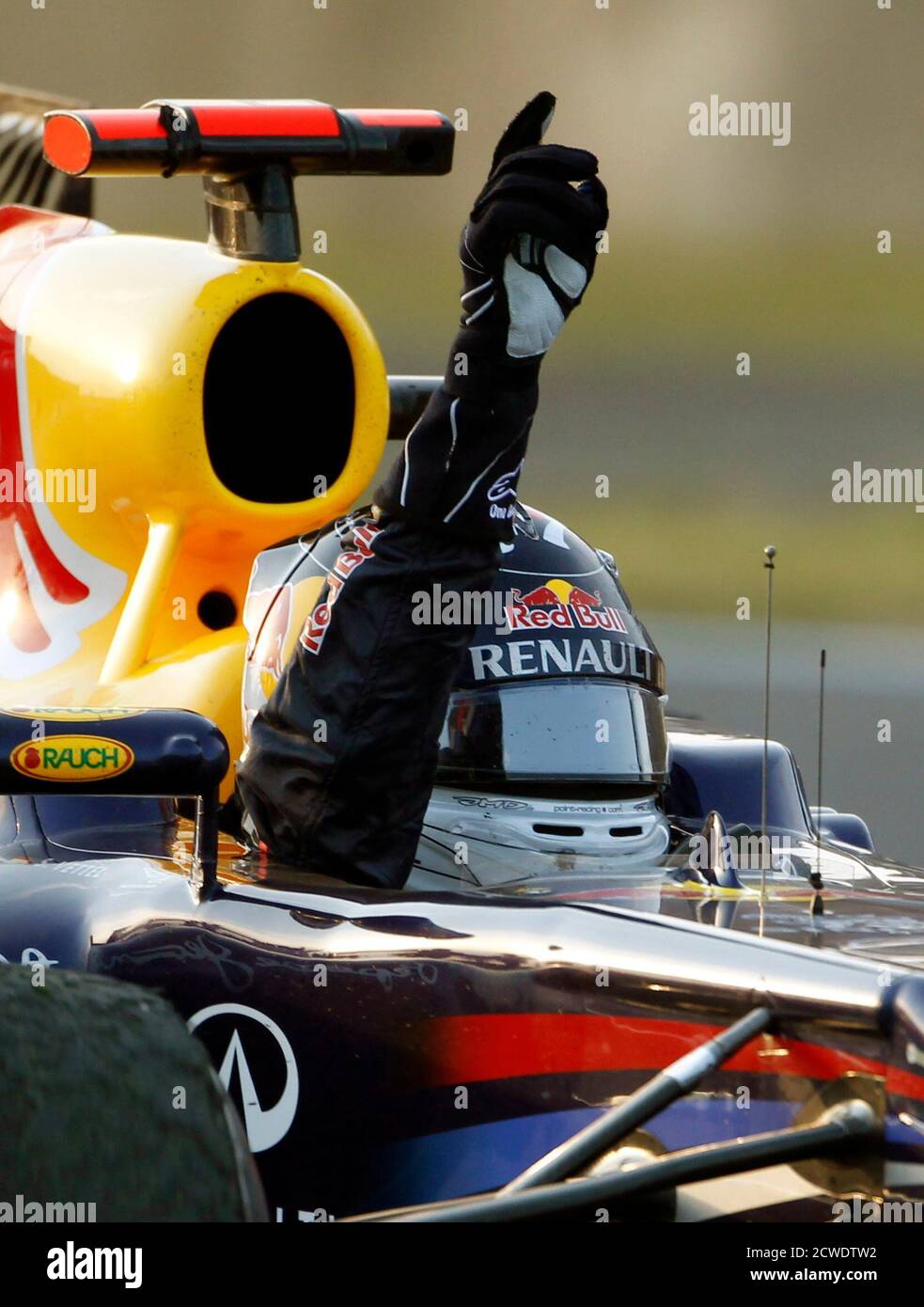 Red Bull Formula One driver Sebastian Vettel of Germany celebrates winning  the world championship after finishing third in the Japanese F1 Grand Prix  at the Suzuka circuit October 9, 2011. Vettel became