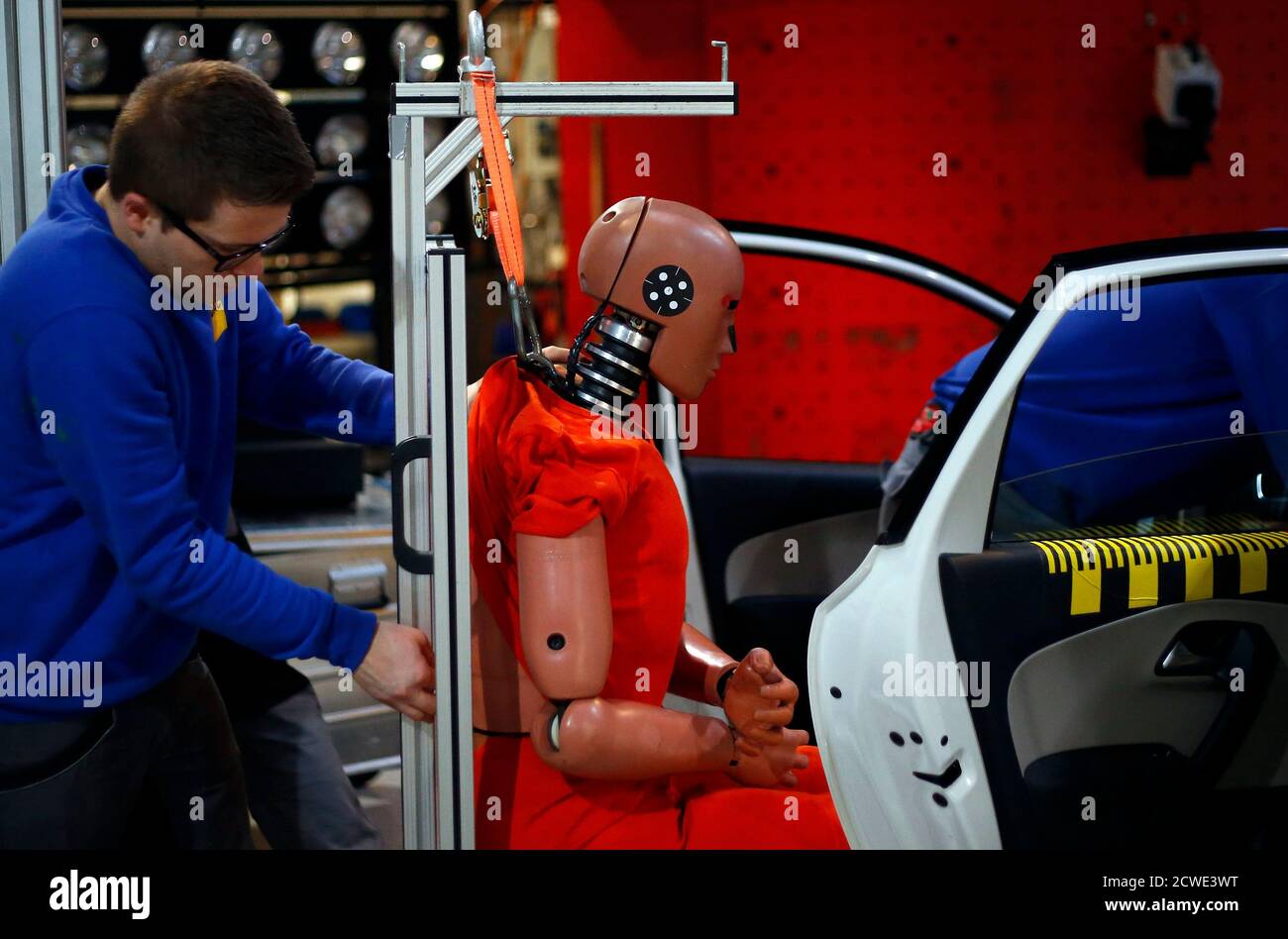 A Technician Prepares A Dummy For A Car Crash Test At The Laboratory Of The German Motor Club Adac In Landsberg December 5 13 The Adac Has A Crash Test Facility Accredited By