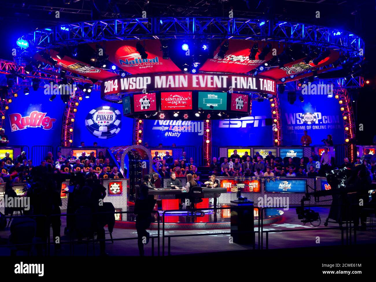Poker players compete for a $10 million first prize at the 2014 World  Series of Poker main event final table at the Rio hotel-casino in Las Vegas,  Nevada, November 11, 2014. At
