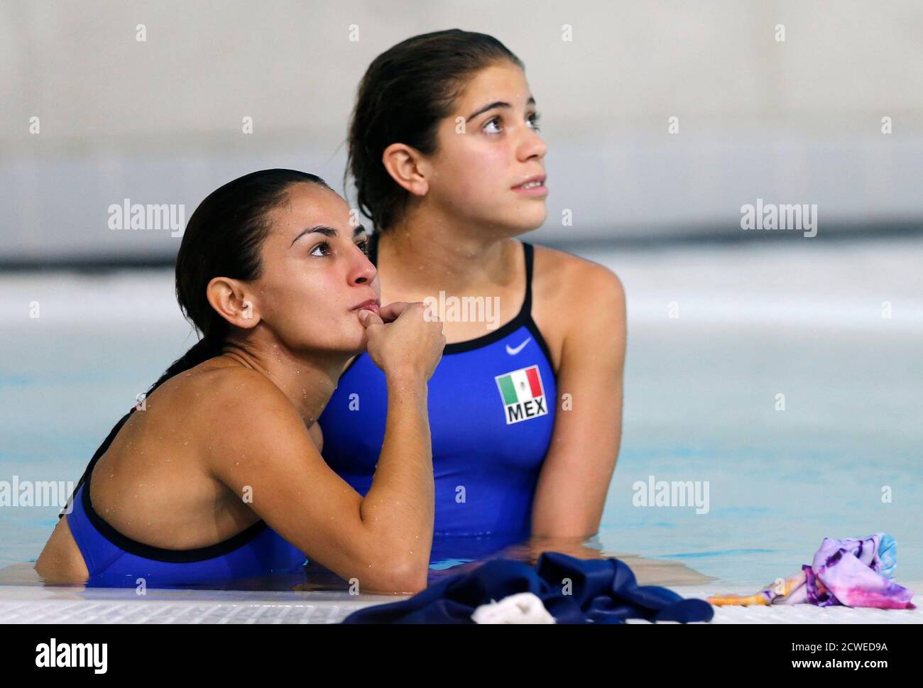 Mexico S Paola Espinosa And Alejandra Orozco R Who Won Silver Watch The Canadian Pair S Last Dive During The Women S Synchronised 10m Platform Final At The London 2012 Olympic Games At The Aquatics