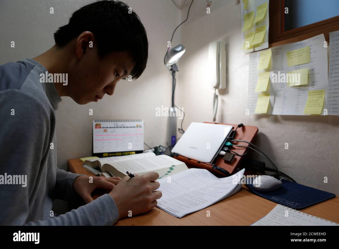 Kim Sa Myeong 27 Studies In His Small Room Called A Goshiwon In One Of The Many Private Dorms That House Students Cramming For Exams In Seoul December 13 12 There Are 30 000 Kim Sa Myeong 27 Studies In His Small Room Called A Goshiwon In One Of The Many Private Dorms That House Students Cramming For Exams In Seoul December 13 12 There Are 30 000