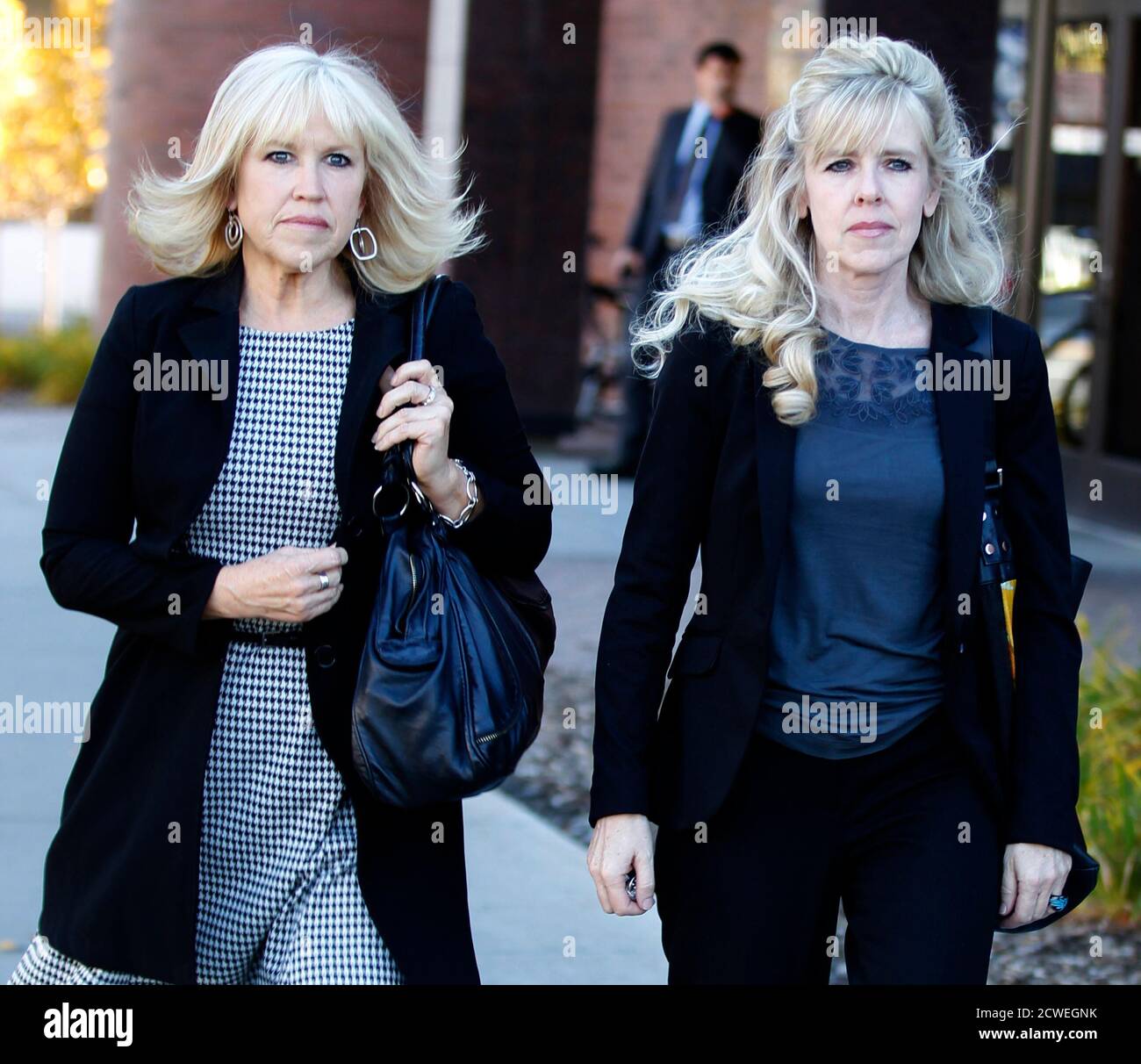 Linda Cluff R And Terry Pearson L Leave The Courthouse For The Day At The Murder Trial For Their Sister Michele Macneill In Provo Utah October 22 13 Martin Macneill 57 A