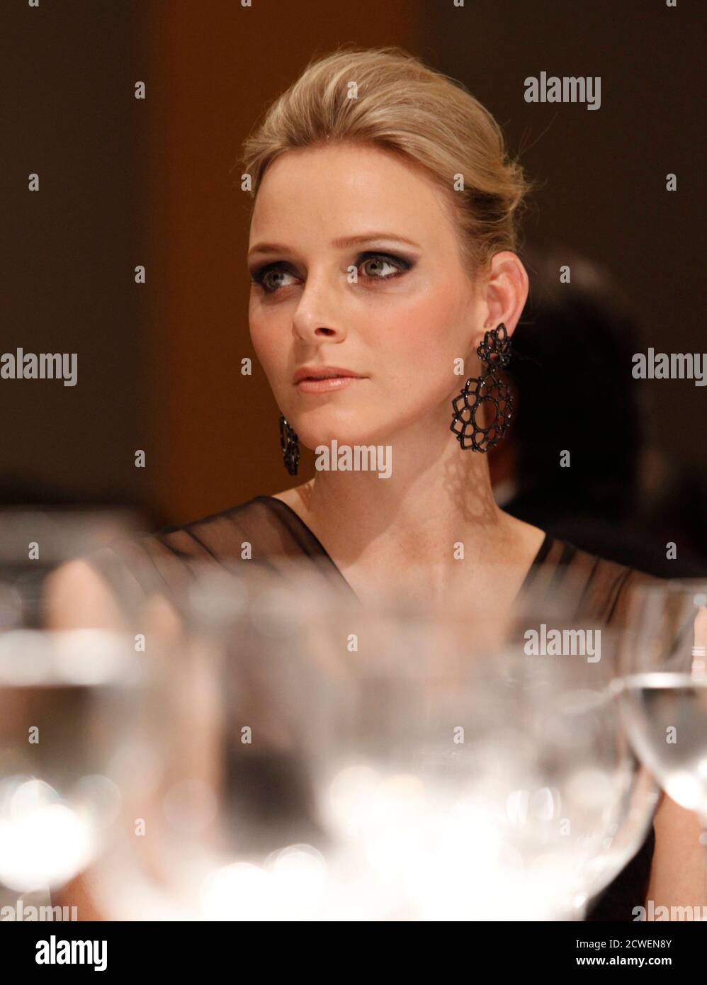 Prince Albert II of Monaco's fiancee Charlene Wittstock attends at a gala dinner hosted by BirdLife International in Tokyo October 29, 2010. REUTERS/Issei Kato (JAPAN - Tags: ROYALS SOCIETY) Stock Photo