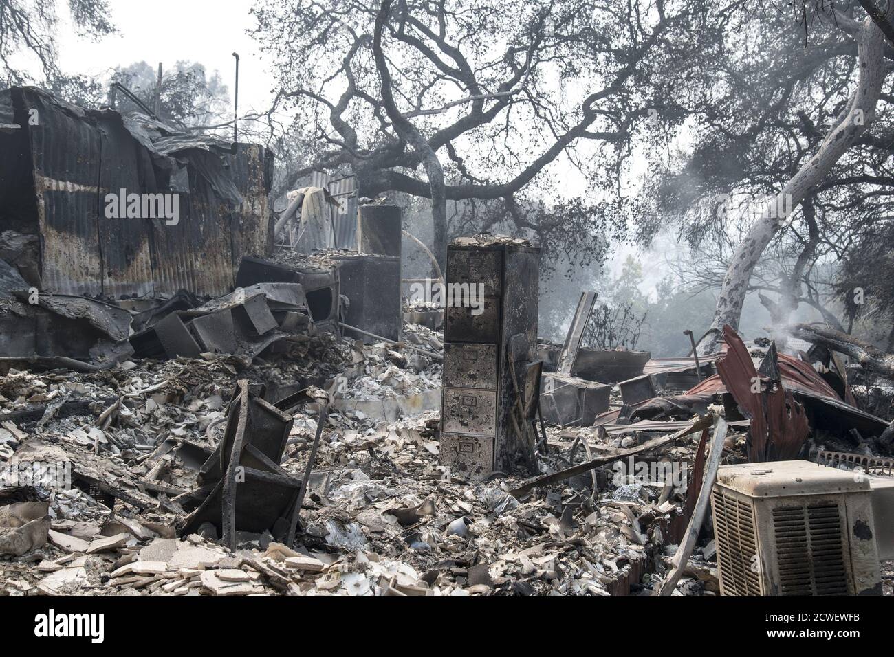 Angwin, United States. 29th Sep, 2020. A burned out residence still smolders in Angwin, California on Tuesday, September 29, 2020. The Glass Fire has burned over 40,000 acres and is only 2% contained. Photo by Terry Schmitt/UPI Credit: UPI/Alamy Live News Stock Photo