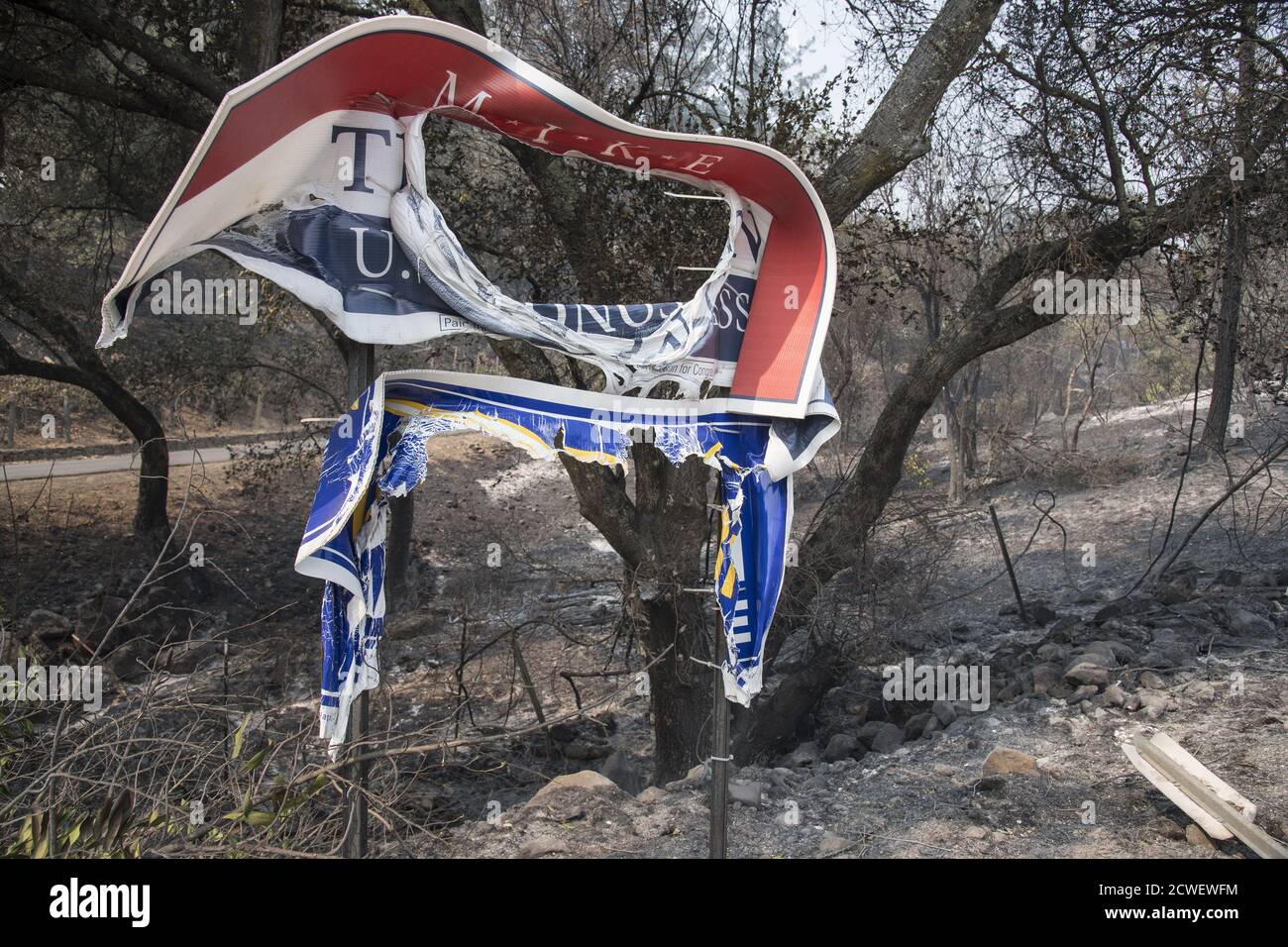 Angwin, United States. 29th Sep, 2020. A plastic Trump for president sign along Deerpark Road is melted by the Glass Fire in Angwin, California on Tuesday, September 29, 2020. The Glass Fire has burned over 40,000 acres and is only 2% contained. Photo by Terry Schmitt/UPI Credit: UPI/Alamy Live News Stock Photo
