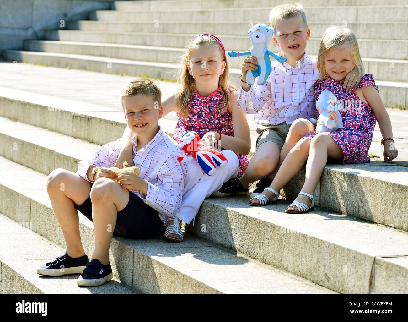 (L-R) Belgium's Prince Gabriel, Princess Elisabeth, Prince Emmanuel and Princess Eleonore pose for photographers in central London ahead of the London 2012 Olympic Games July 26, 2012. Picture taken on July 26, 2012.                  REUTERS/Benoit Doppagne/Pool   (BRITAIN  - Tags: SPORT ROYALS POLITICS SPORT OLYMPICS) Stock Photo