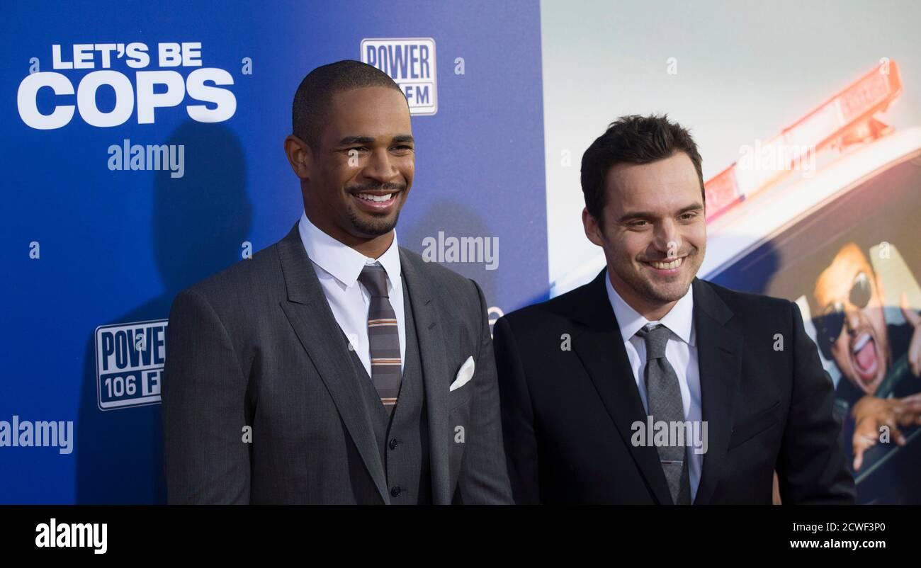 Cast Members Jake Johnson R And Damon Wayans Jr Pose At The Premiere Of Let S Be Cops In Hollywood California August 7 14 The Movie Opens In The U S On August 13