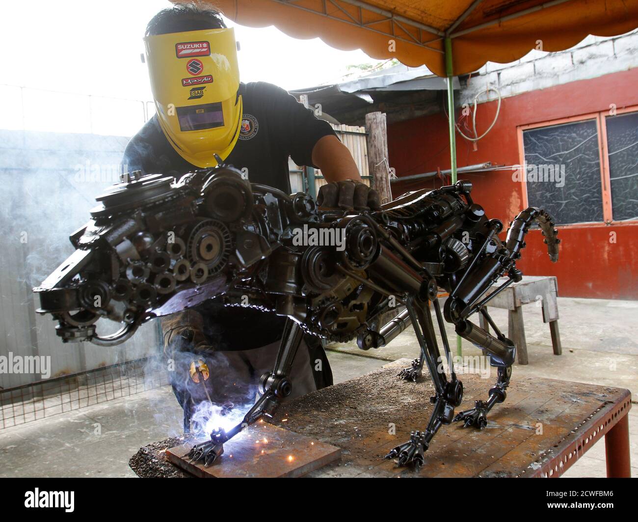 Welded Sculptures Of Metal High Resolution Stock Photography And Images Alamy Welded sculpture (related to visual art and works of art) is an art form in which sculpture is made using welding techniques. https www alamy com filipino draftsman mario mallari jr welds scrap metal into a panther looking art piece inside his workshop in quezon city metro manila july 17 2012 these sculptures are made from the nuts and bolts of old typewriters automotive parts and other discarded metallic appliances found in junk shops that are creatively welded together to form his unique art pieces reuterscheryl ravelo philippines tags society image377122598 html