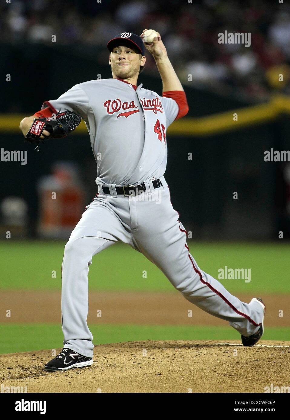 Washington Nationals' pitcher Ross Detwiler delivers a pitch against the Arizona Diamondbacks during their MLB baseball game in Phoenix, Arizona, August 12, 2012. REUTERS/Darryl Webb (UNITED STATES - Tags: SPORT BASEBALL) Stock Photo